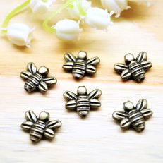 Perles abeille bronze 14*12 mm par lot de 10