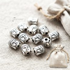 Perles argentées têtes de Bouddha 7*5 mm par 10