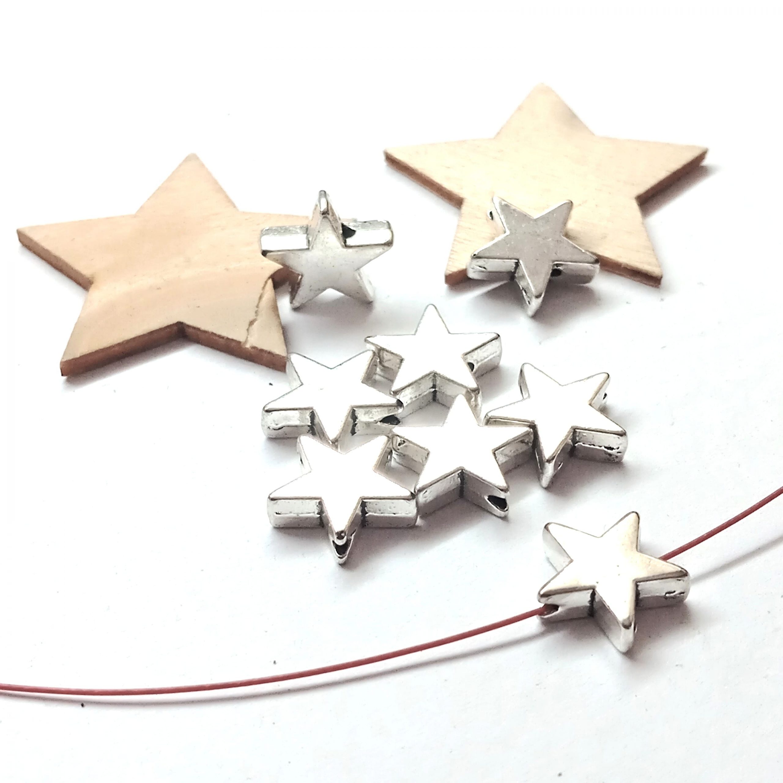 Perles étoiles 11mm en métal argenté par lot de 10 – Image 2