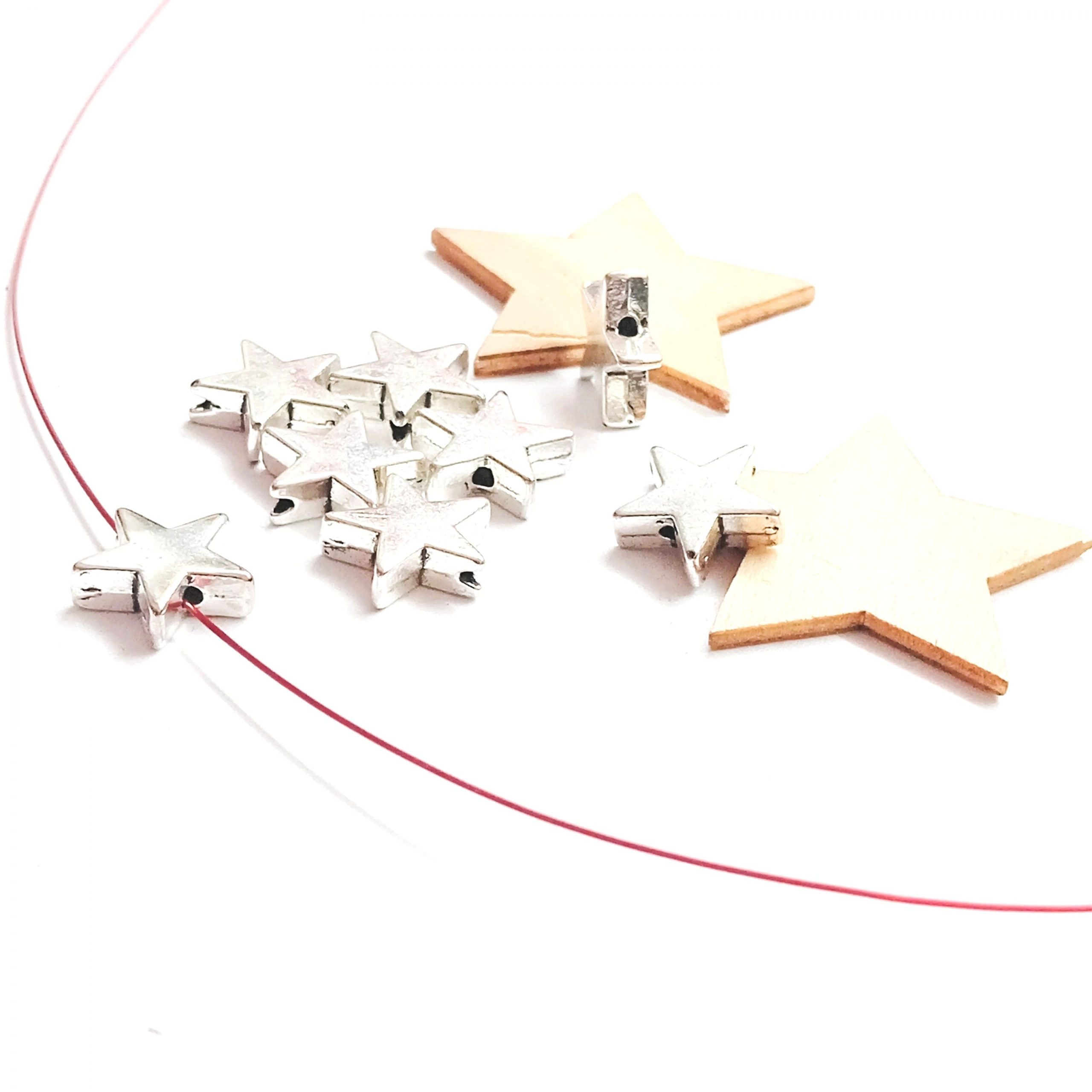 Perles étoiles 11mm en métal argenté par lot de 10 – Image 3