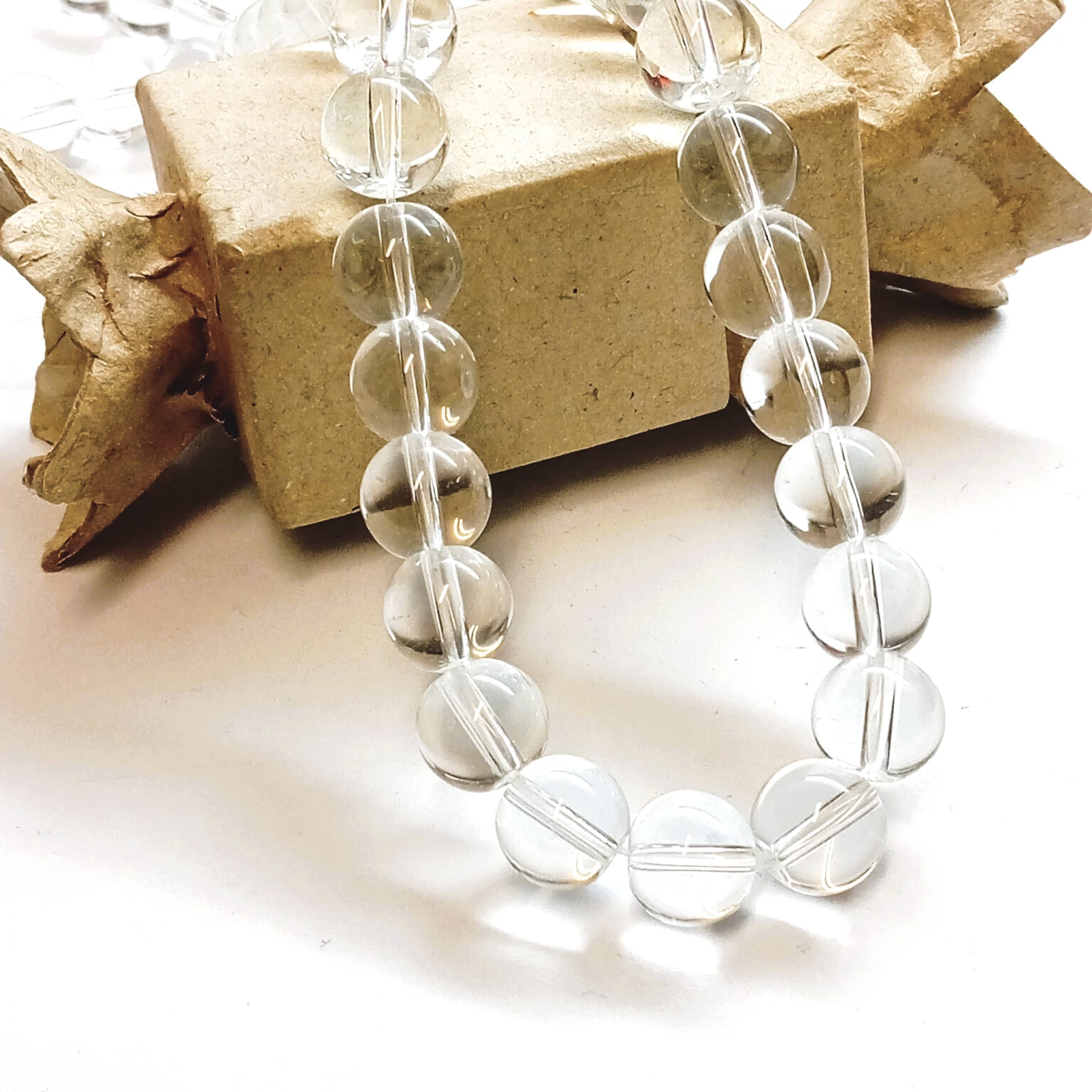 Perles rondes lisses 10mm en cristal de roche naturel du Brésil ou de l'Uruguay pour création de bijoux