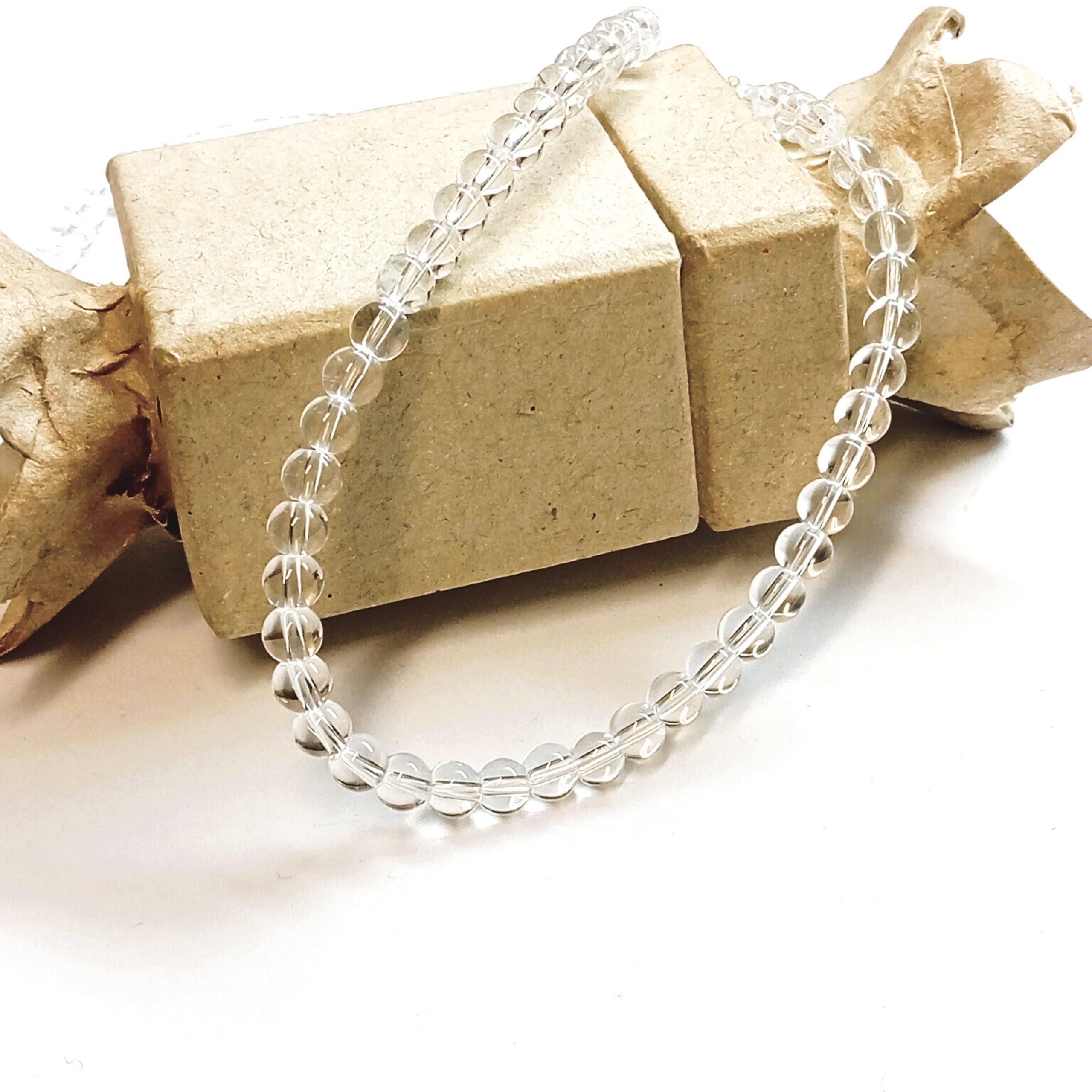 Perles rondes lisses 4mm en cristal de roche naturel du Brésil ou de l'Uruguay pour création de bijoux