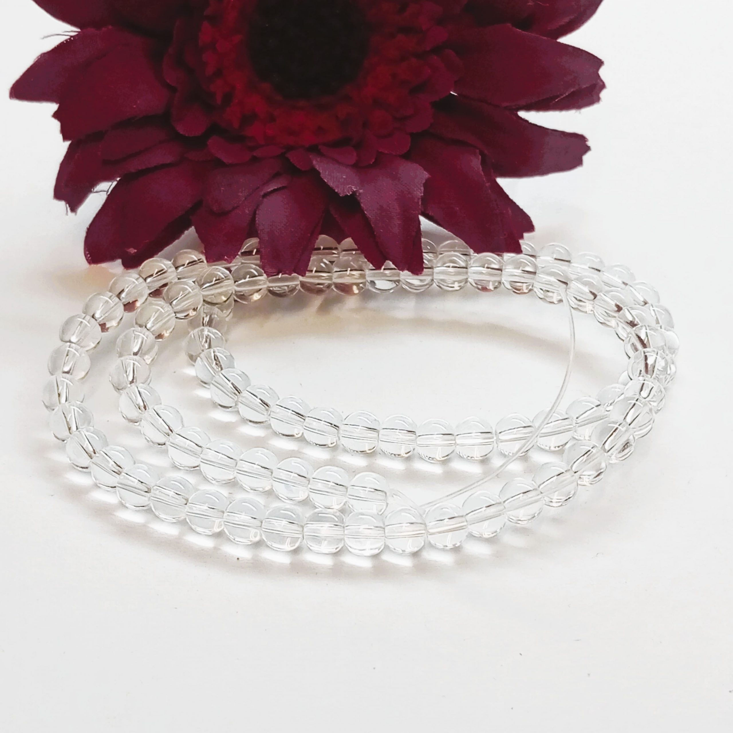 Perles rondes lisses 4mm en cristal de roche naturel du Brésil ou de l'Uruguay pour création de bijoux