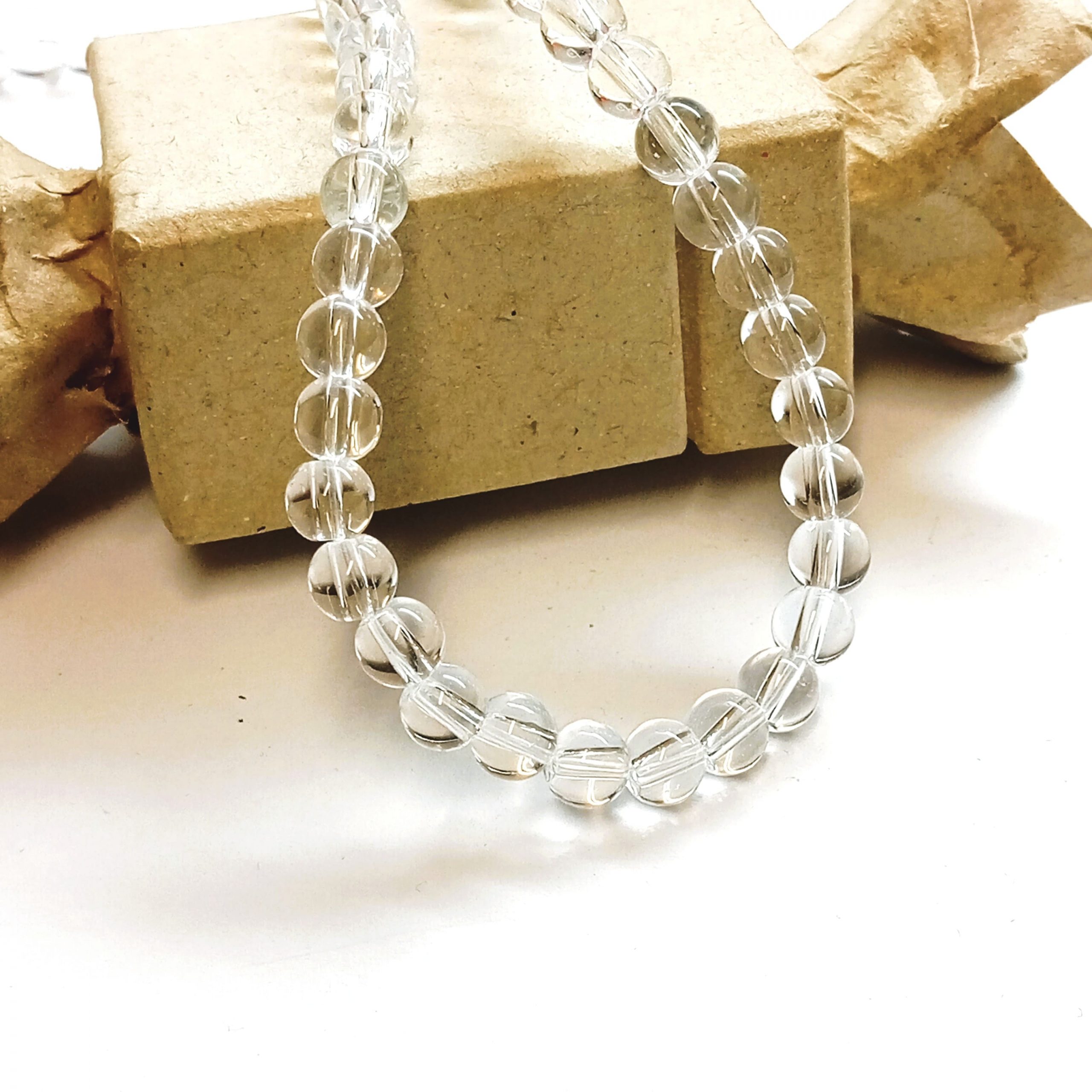 Perles rondes lisses 6mm en cristal de roche naturel du Brésil ou de l'Uruguay pour création de bijoux