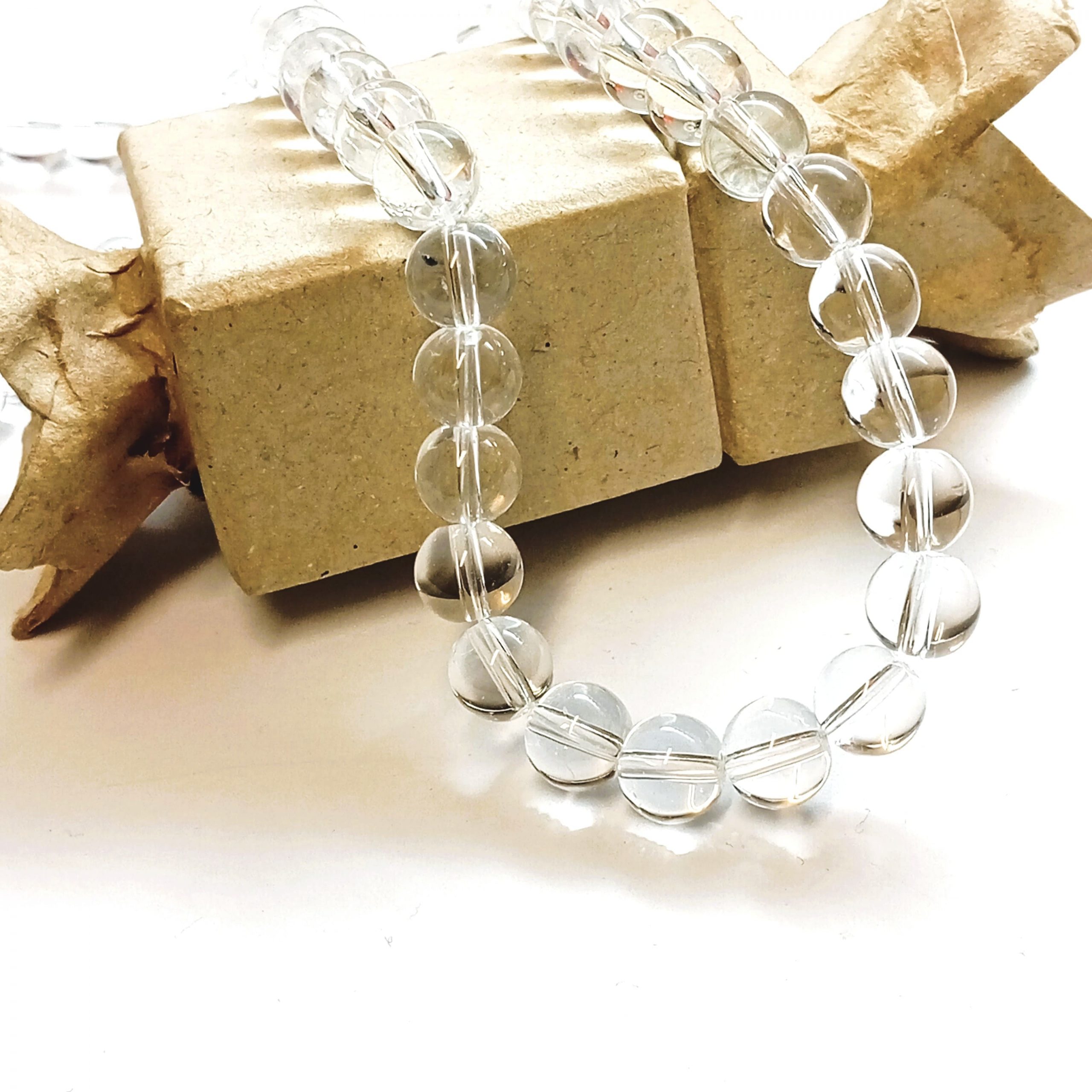 Perles rondes lisses 8mm en cristal de roche naturel du Brésil ou de l'Uruguay pour création de bijoux