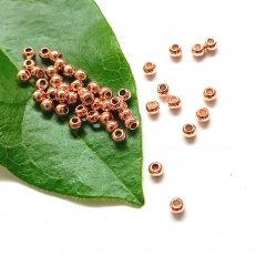 Mini perles or rose en laiton 3mm par lot de 50