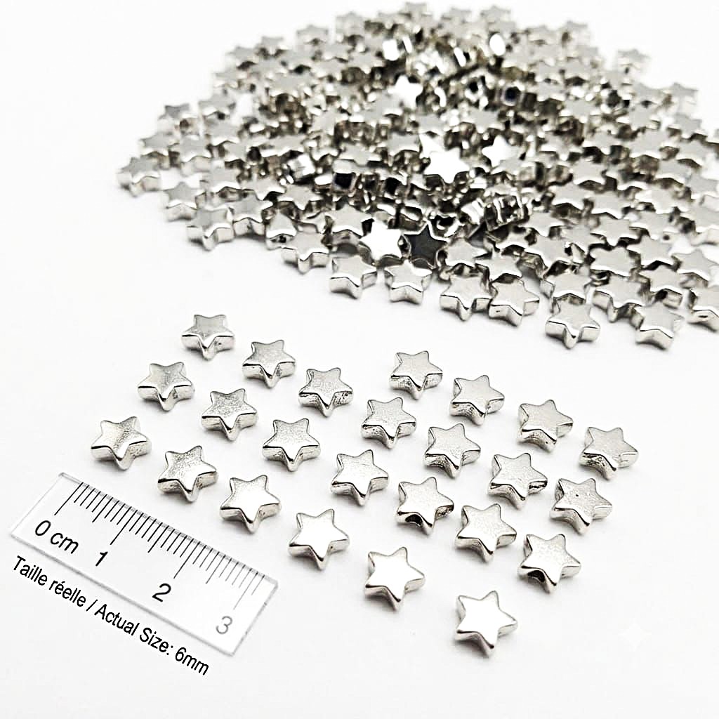 Perles étoiles en métal argenté 6mm par lot de 20